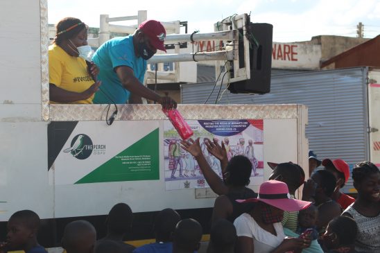 Women and gilrs receive saniatry pads in Bindura during a WAG Road Show